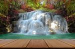 Perspective Window View Of Waterfall With Autumn Forest Stock Photo