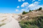 Sand Dunes And Grass Vegetation Background Stock Photo