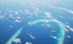 View On Maldives Island From Airplane Stock Photo