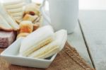 Bread In Saucer On Table Stock Photo