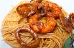 Italian Seafood Spaghetti Pasta On Red Tomato Sauce Stock Photo