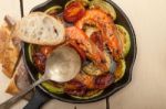 Roasted Shrimps With Zucchini And Tomatoes Stock Photo