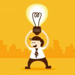 Business Man Stand With Light Bulb Idea Stock Photo