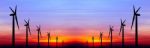 Wind Turbine Silhouette On Colorful Sunset Stock Photo