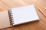 Notebook With Pencil Stock Photo