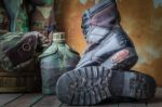 Old Boots On A Wooden Stock Photo