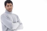 Young Man With Crossed Arms Stock Photo