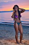 Beautiful Black African American Woman Posing On The Beach At Su Stock Photo