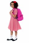 Curly Haired Elementary School Girl Stock Photo