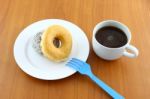 Sugar And Chocolate Donut On Breaking Time Stock Photo