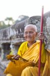 An Unidentified Old Buddhist Female Monk Dressed In Orange Toga Stock Photo