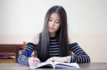 Portrait Of Thai Teen Beautiful Girl Writing Book Stock Photo