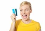 Smiling Young Girl Holding Debit-card Stock Photo