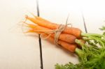 Baby Carrots Bunch Tied With Rope Stock Photo