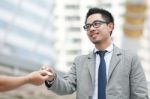 Businesspeople Exchanging Cards Stock Photo