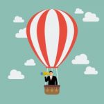 Businessman In Hot Air Balloon Search To Success Stock Photo