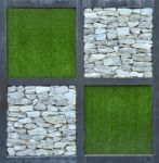 Grass And Stone Wall Background Stock Photo