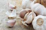 Garlic On Cement Floor Stock Photo