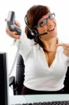 Female Giving Telephone Receiver Stock Photo