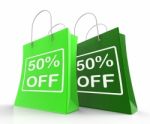 Fifty Percent Off On Shopping Bags Shows 50 Bargains Stock Photo