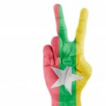 Flag Of Myanma In Victory Hand Stock Photo