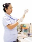 Nurse Holding Syringe Stock Photo