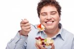 Chubby Man With Fresh Salad Stock Photo