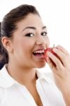 Lady Eating An Apple Stock Photo