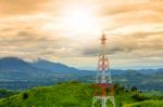 Telecommunication Tower During Sunset Mountain Background In Rai Stock Photo