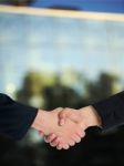 Businesspeople handshaking Stock Photo