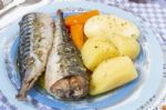 Mackerel Fish With Potato And Carrot Stock Photo