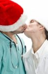 Kissing Doctors Couple Stock Photo