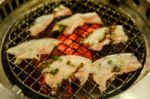 Grilling Pork On Grill Stock Photo