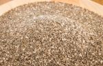 Nutritious Chia Seeds On A Wooden Plate Stock Photo