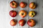 Summer Red Apples On White Boards Stock Photo