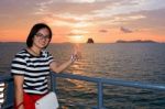 Women Tourist Cruising At Sunset Stock Photo