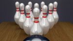 Bowling Pins On Racked Near Strike Stock Photo