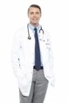 Casual Portrait Of Handsome Male Surgeon Stock Photo