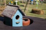 Wooden Bird House Decorated On The Table Stock Photo
