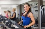 Woman Running On Treadmill Stock Photo