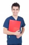 Doctor Holding Folder Stock Photo