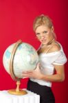 Sexy Woman Teacher With Globe Stock Photo