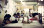 Blurred Children In The Art Room Background Stock Photo