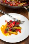 Fried Chili Pepper And Vegetable On A Wok Pan Stock Photo