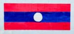 Painting Flag Of Laos On Wall Stock Photo