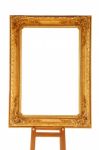 Vintage Gold Picture Frame With Wooden Easel Isolated On White Stock Photo