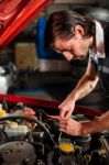 Auto Mechanic Fixing Car Engine Stock Photo