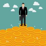 Businessman Standing On Money Stock Photo