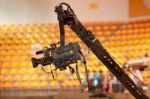 TV Camera On Crane In Studio Stock Photo