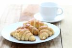 Croissant And Coffee Stock Photo